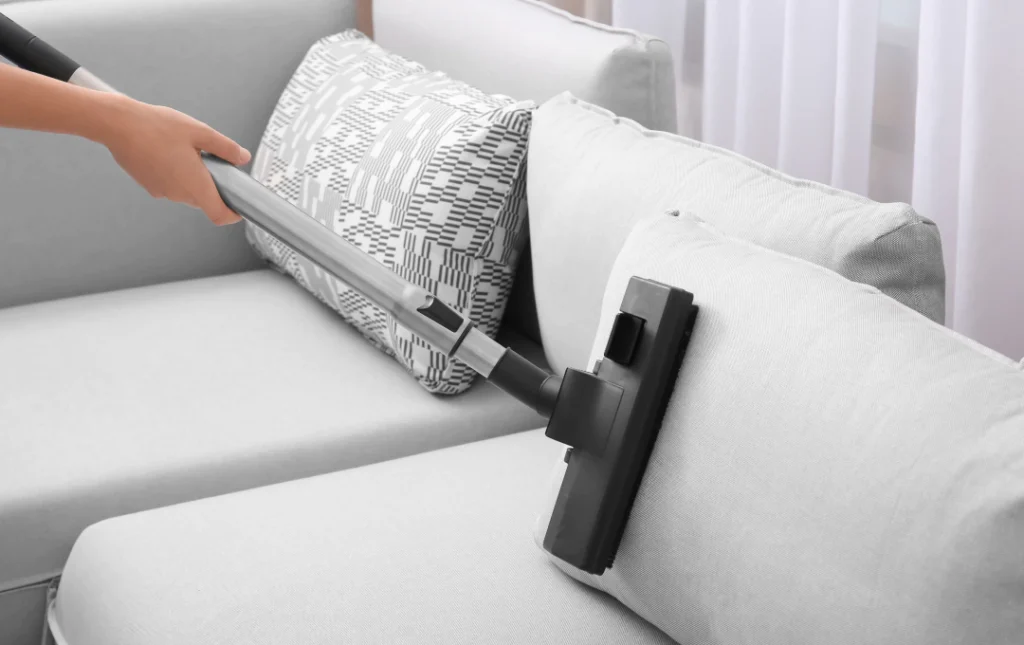 vacuum doing upholstery cleaning in clear lake tx