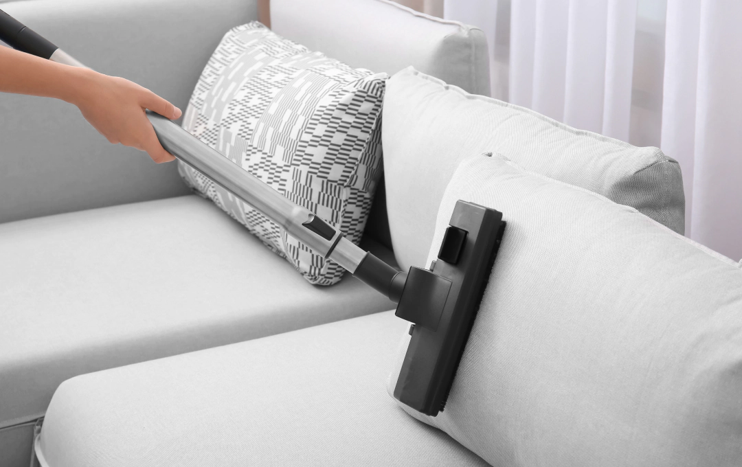 vacuum doing upholstery cleaning in clear lake tx